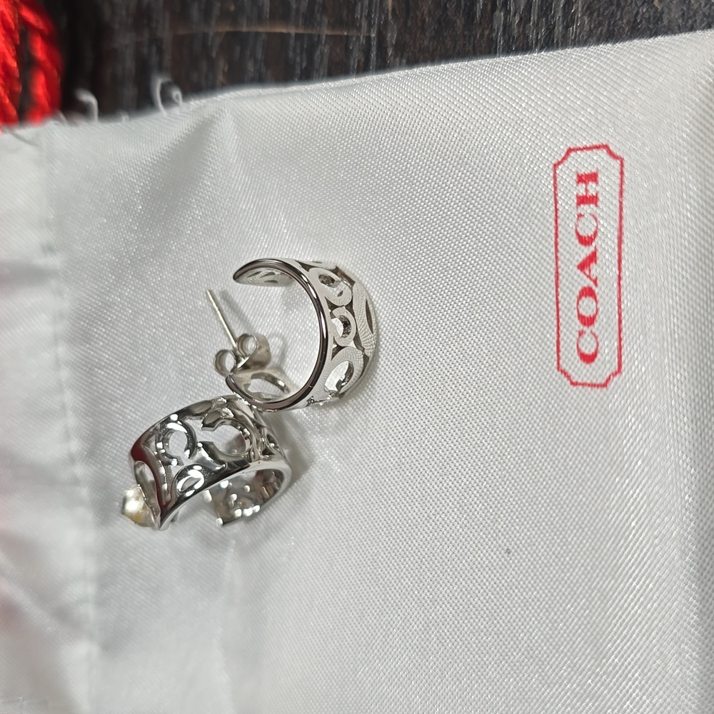 Coach earrings new with no tags